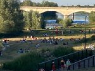 Locals were setting up picnics and getting a good spot for the Bastille Day fireworks show to happen at 11pm