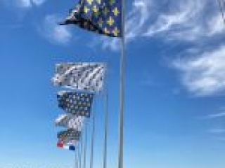 The flags previously seen from the ground below