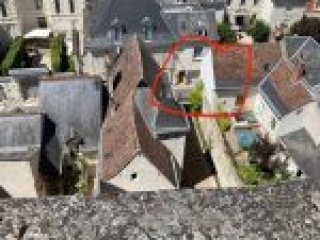 Another view of our Air BNB from atop the castle! People really live in these homes that share a backyard with the castle.